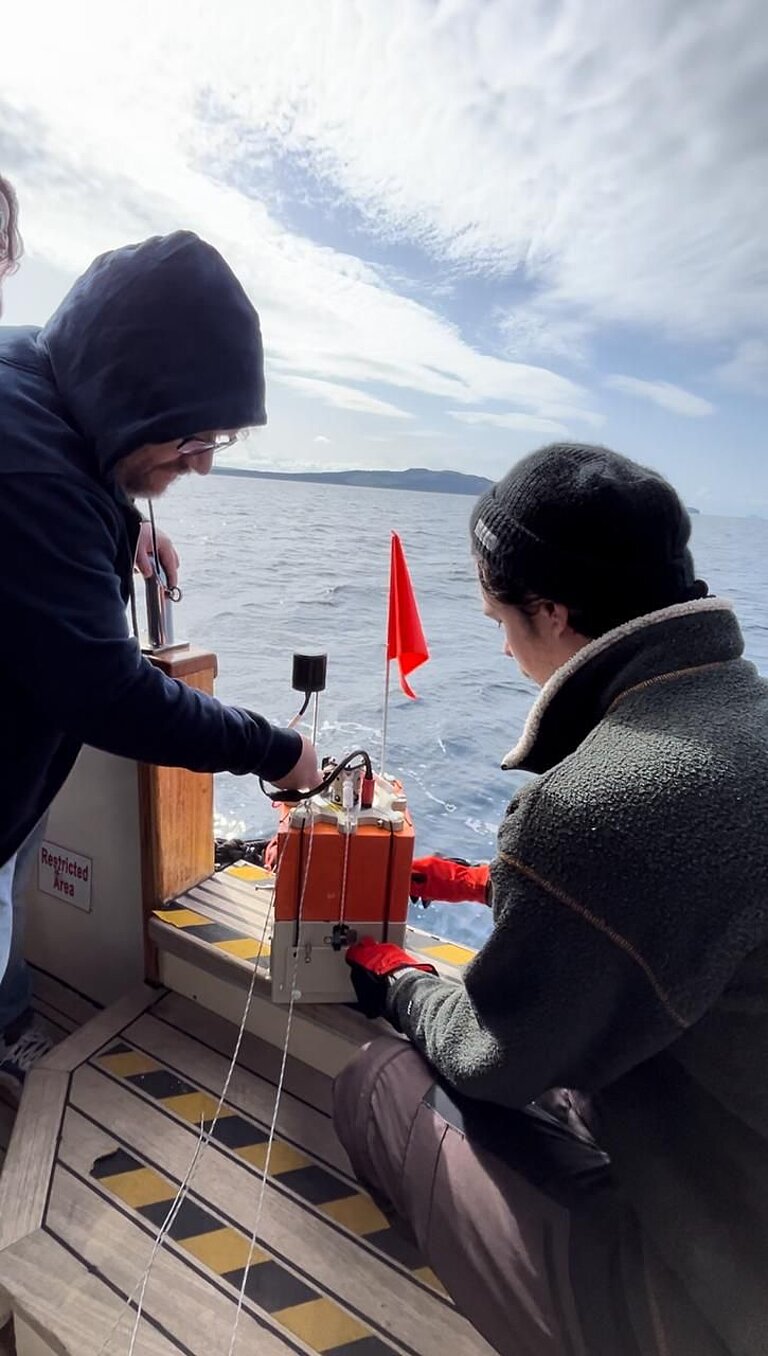 Researchers preparing a MOLA lander for deployment offshore Santorini